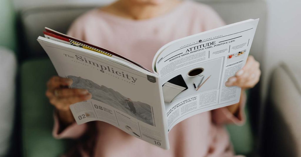 Woman Reading Newspaper